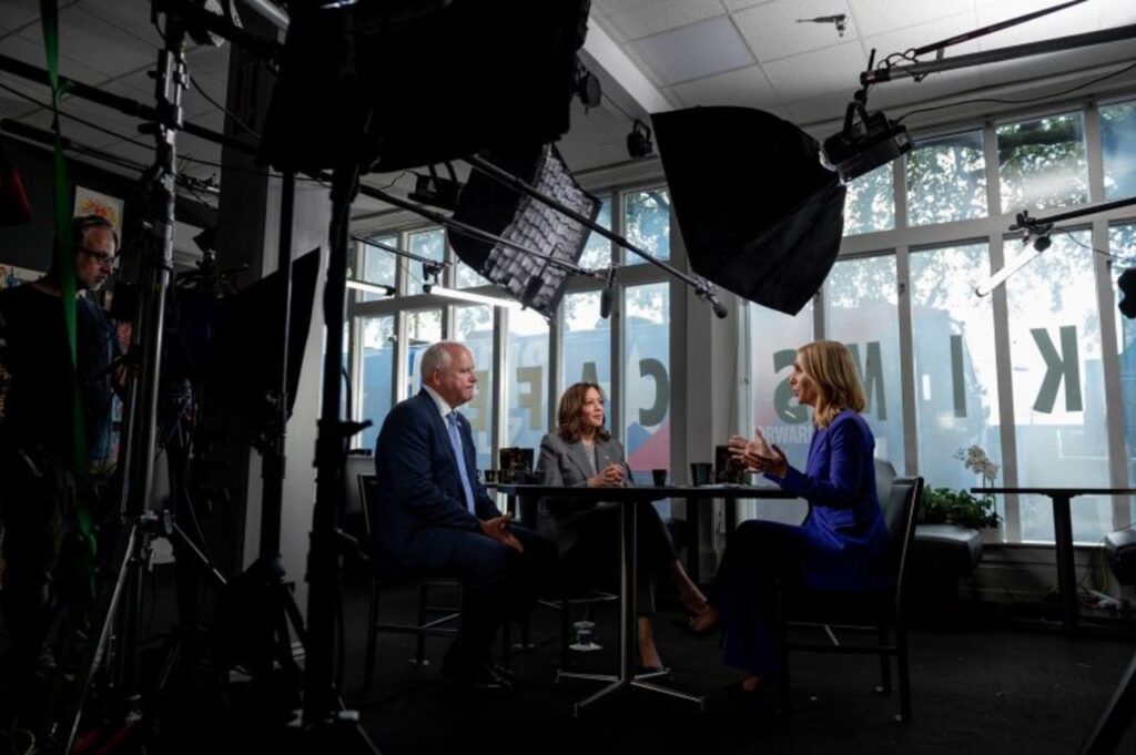 CNN's Dana Bash talks with Vice President Kamala Harris and Minnesota Governor Tim Walz at Kim's Cafe in Savannah, Georgia, on August 29.