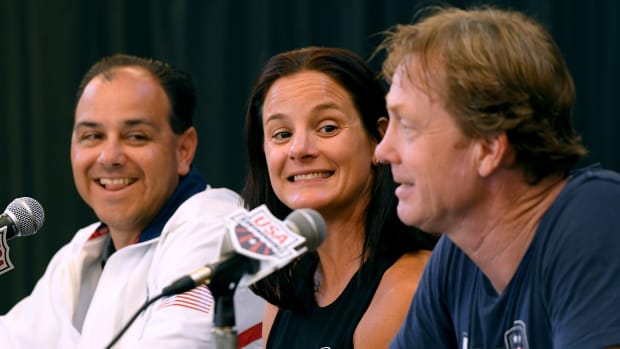 National Team Executive Director Lindsay Mintenko, center, speaks during a press conference in 2018.